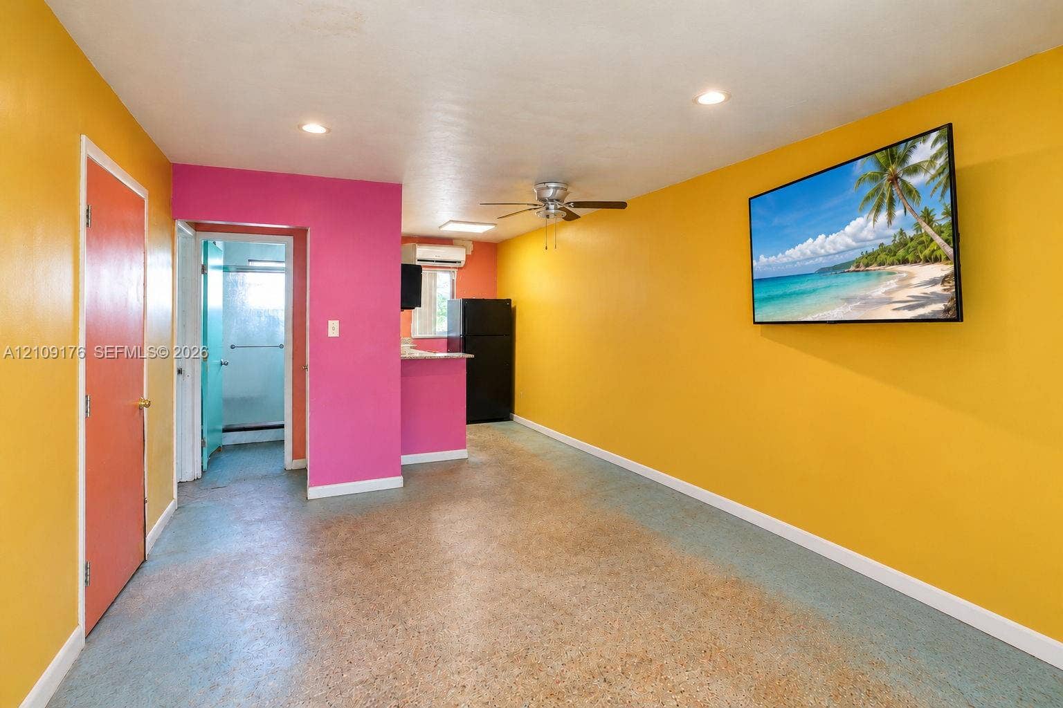 Interior space featuring recessed lighting, a ceiling fan, and concrete flooring