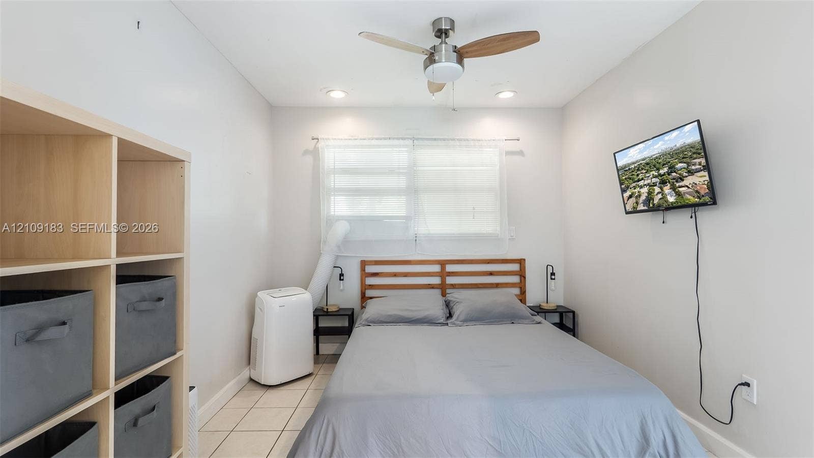 1009 NE 17th Court, Fort Lauderdale, FL 33305 Room featuring tiled flooring, recessed ceiling lighting, and a multi-blade ceiling fan
