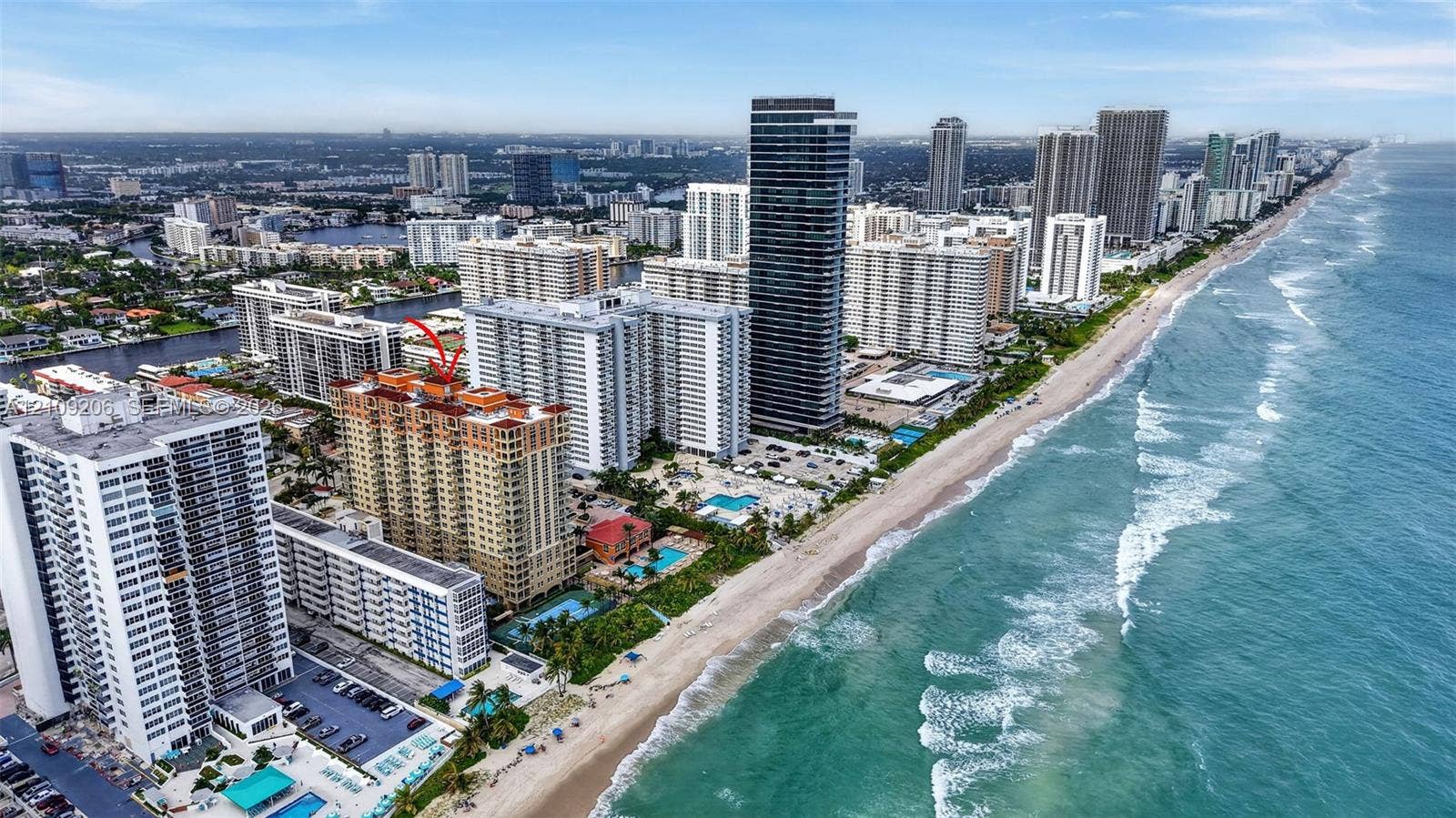 2080 S Ocean Drive, #112, Hallandale Beach, Hallandale Beach, FL 33009 Aerial perspective featuring a high-rise residential building situated on the Atlantic coastline