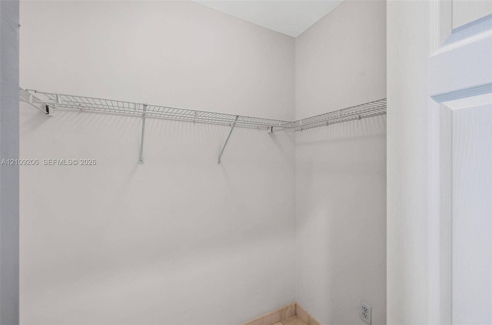 2080 S Ocean Drive, #112, Hallandale Beach, Hallandale Beach, FL 33009 Storage space featuring wall-mounted wire shelving and neutral painted walls
