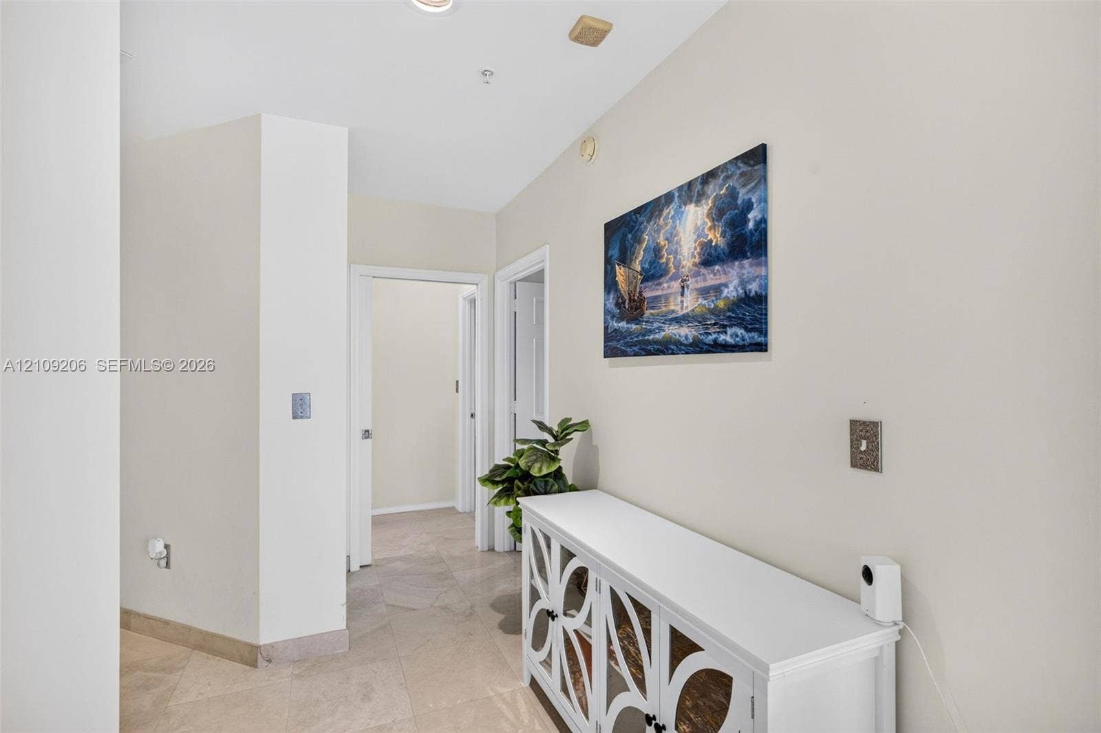 2080 S Ocean Drive, #112, Hallandale Beach, Hallandale Beach, FL 33009 Neutral-toned interior hall featuring stone-tile flooring and recessed ceiling lighting