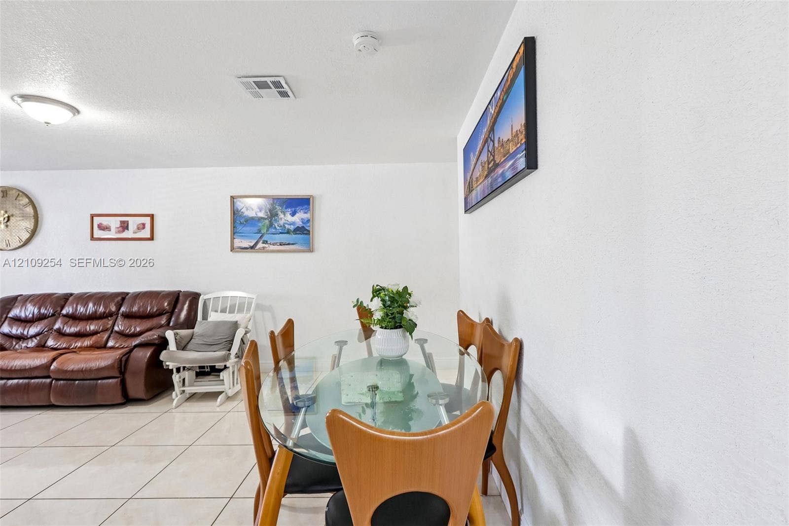 21342 NW 40th Cir Court, Miami Gardens, FL 33055 Neutral-toned tile flooring and crisp white walls