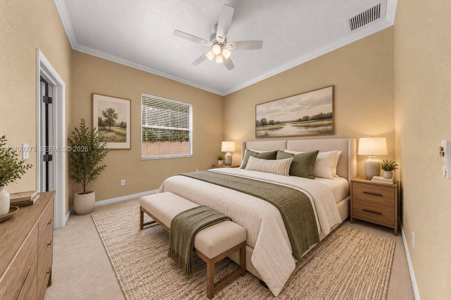 1035 SW 33rd Place, Ocala, FL 34471 Bedroom featuring neutral wall paint, carpeted flooring, crown molding, and a white ceiling fan with integrated lighting