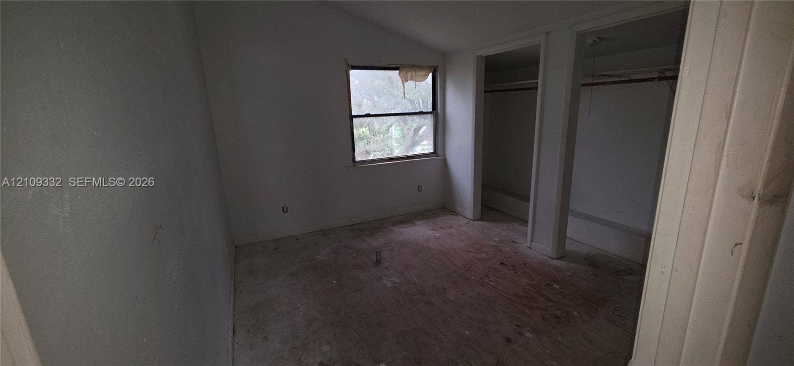 Vaulted ceiling, natural lighting, and dual reach-in closet spaces