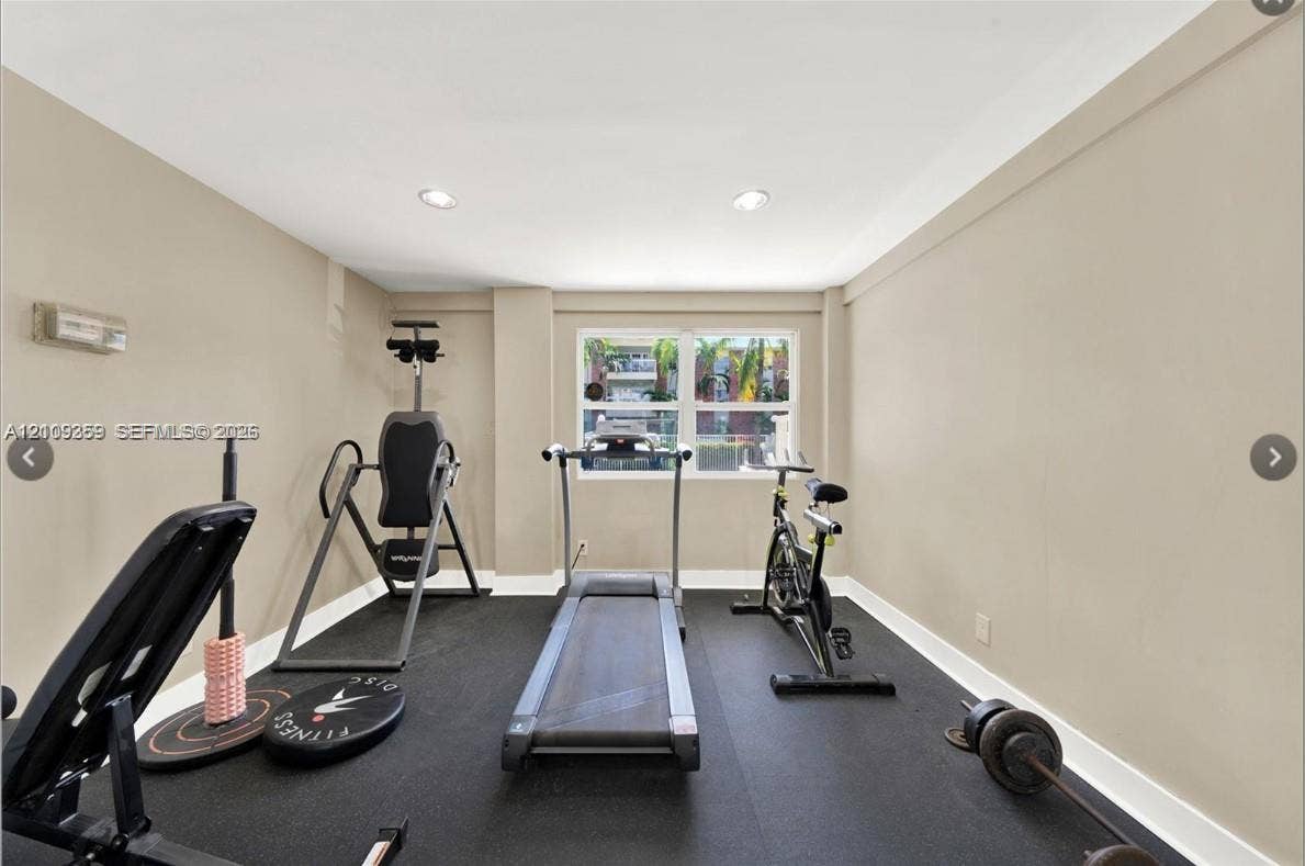 2426 SE 17th Causeway, #103A, Fort Lauderdale, FL 33316 Interior room featuring neutral wall paint, recessed lighting, and impact-resistant rubberized flooring
