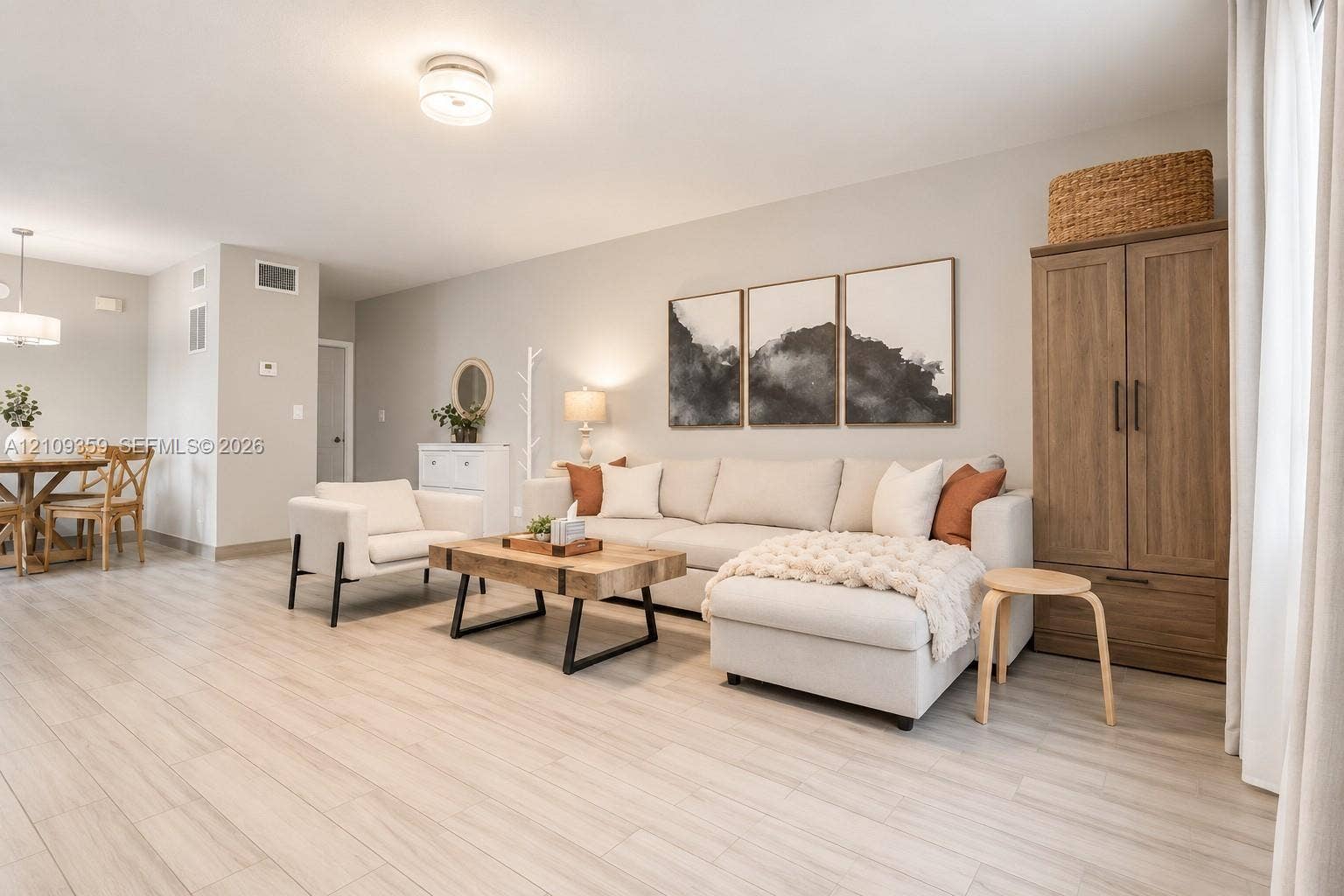 2426 SE 17th Causeway, #103A, Fort Lauderdale, FL 33316 Open floor plan featuring wood-finish flooring, neutral wall color, and flush-mount ceiling lighting