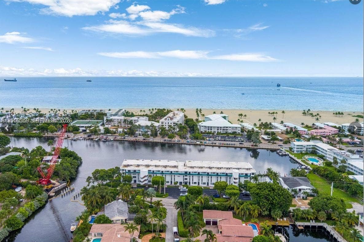 2426 SE 17th Causeway, #103A, Fort Lauderdale, FL 33316 Aerial perspective featuring direct oceanfront access, pristine sandy shoreline, and waterfront proximity