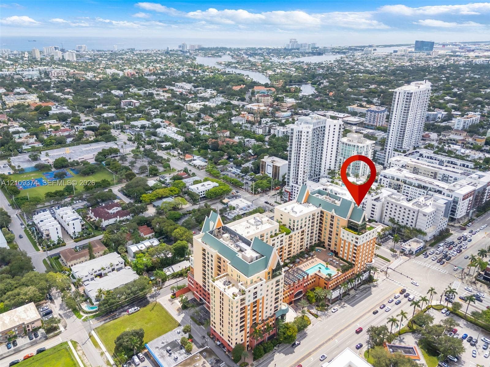 100 N Federal Highway, #1, Fort Lauderdale, FL 33301 High-rise residential building featuring a multi-story exterior, steep-pitched roofing, and a dedicated podium-level swimming pool