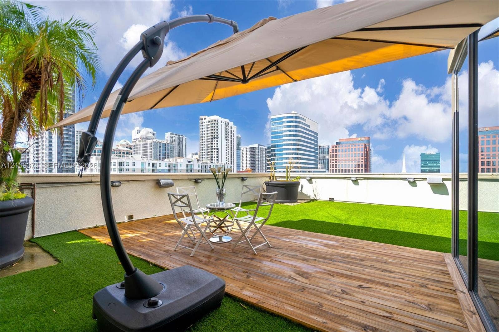 100 N Federal Highway, #1, Fort Lauderdale, FL 33301 Rooftop terrace featuring synthetic turf, wood-finish decking, and low-profile perimeter walls