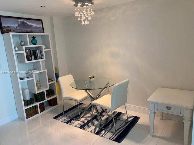 Polished tile flooring and decorative crystal-accented flush-mount lighting