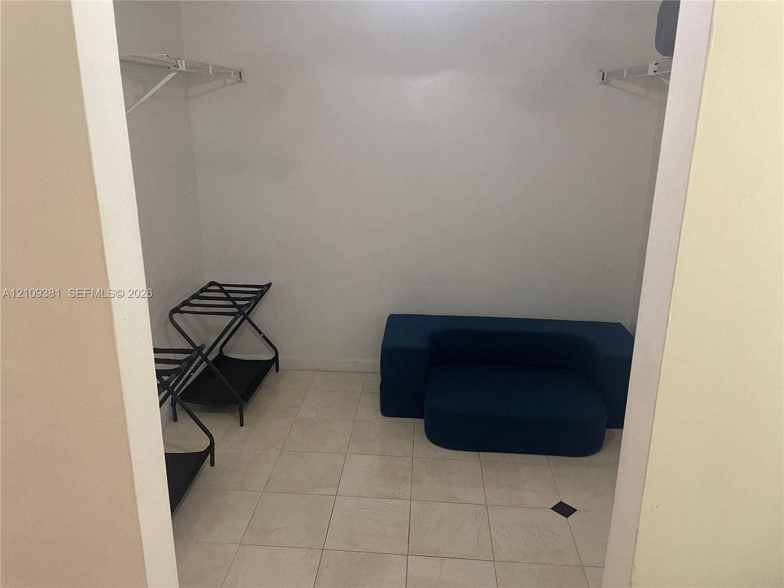 26 Diplomat Parkway, #2351, Hallandale Beach, FL 33009 Neutral-toned tile flooring featuring inlaid square accent tiles
