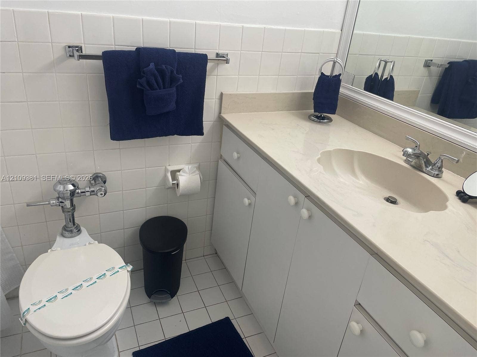 26 Diplomat Parkway, #2351, Hallandale Beach, FL 33009 Walk-in storage space featuring ceramic tile flooring and overhead wire shelving