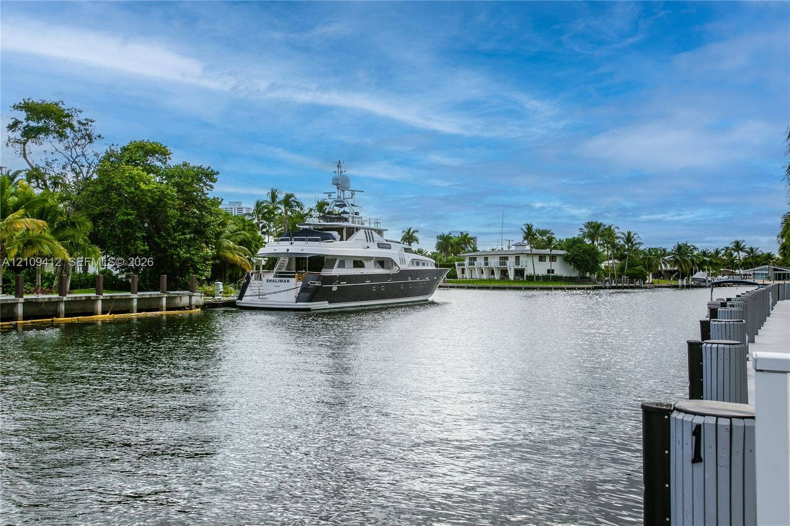 137 Golden Isles Drive, #408, Hallandale Beach, FL 33009 Waterfront bulkhead featuring concrete pilings and deep-water access with canal frontage