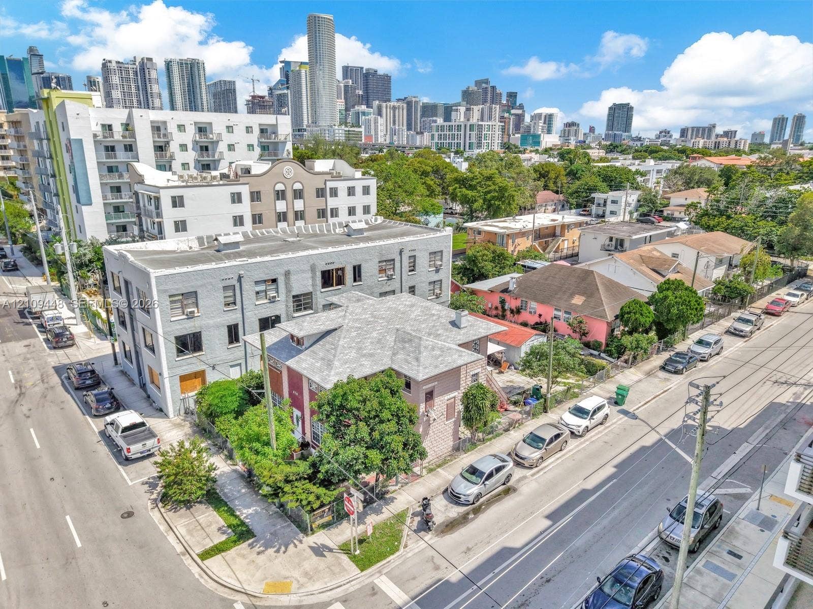 676 SW 1st Street, Miami, FL 33130 Corner-lot property featuring an urban setting with multi-story building architecture and proximity to a dense metropolitan skyline