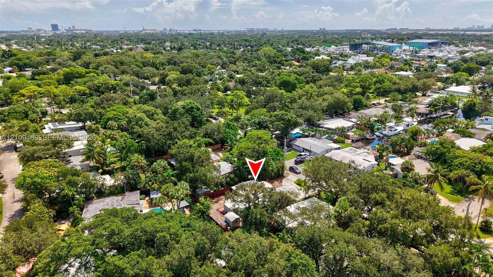 Fort Lauderdale, FL 33312 Aerial perspective featuring mature tree canopy, dense residential greenery, and proximity to coastal waterways