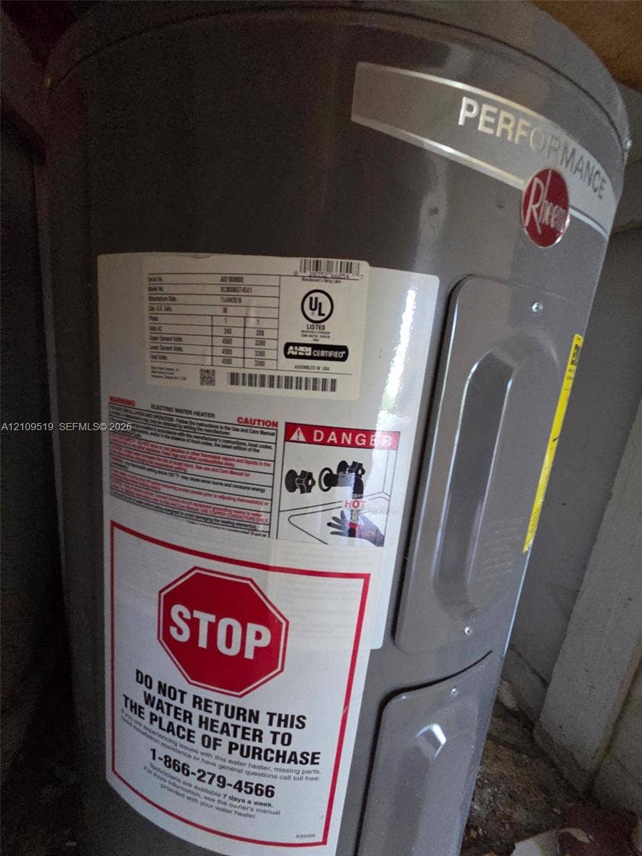 11081 NW 7th Street, #101-14, Miami, FL 33172 Electric water heater inside laundry closet area inside unit