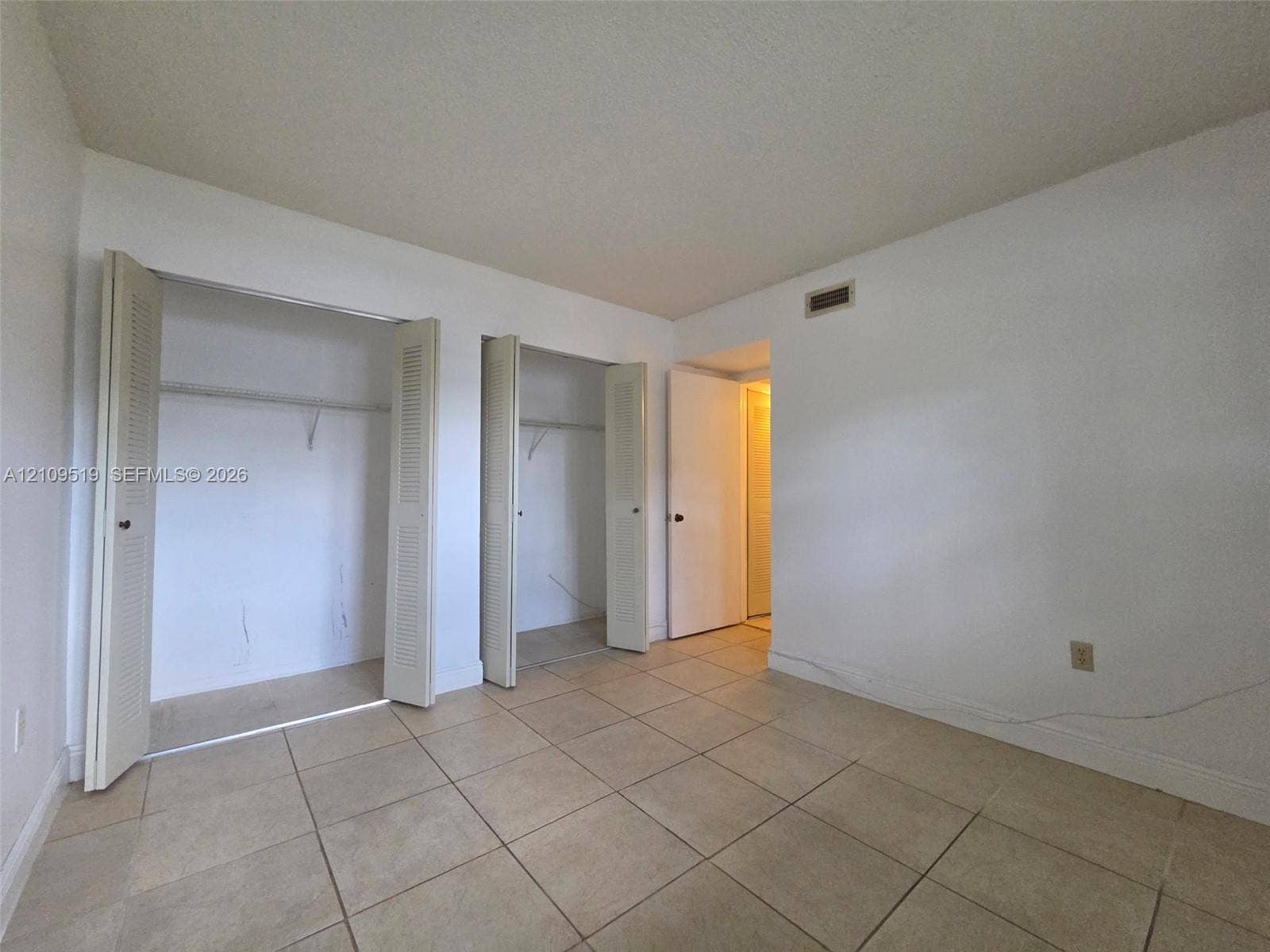 11081 NW 7th Street, #101-14, Miami, FL 33172 Second bedroom with natural light and two closets