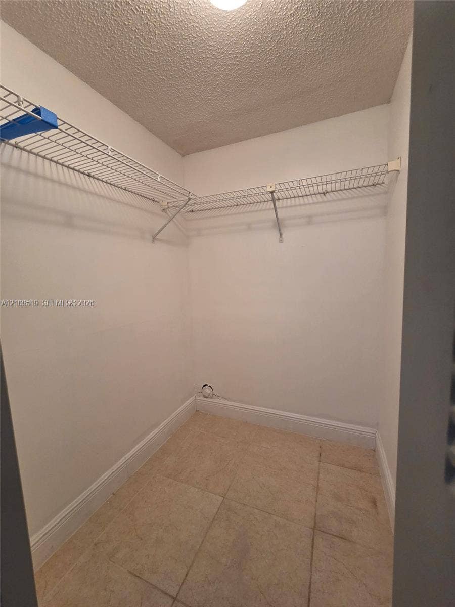 11081 NW 7th Street, #101-14, Miami, FL 33172 Walk-In closet in Primary bedroom suite