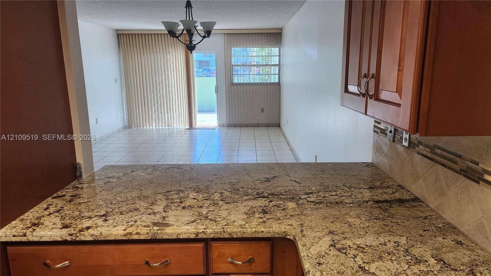 11081 NW 7th Street, #101-14, Miami, FL 33172 Easy access pass-thru granite counter/Breakfast counter.
