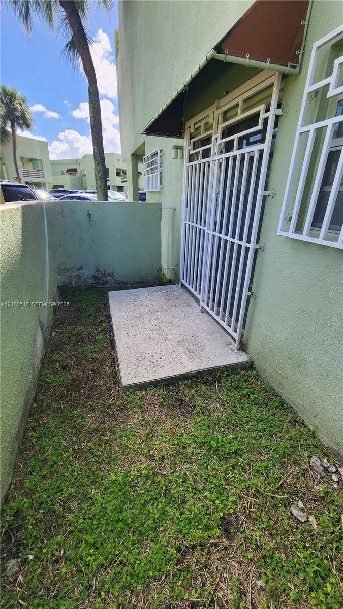 11081 NW 7th Street, #101-14, Miami, FL 33172 Gated private terrace patio to primary bedroom