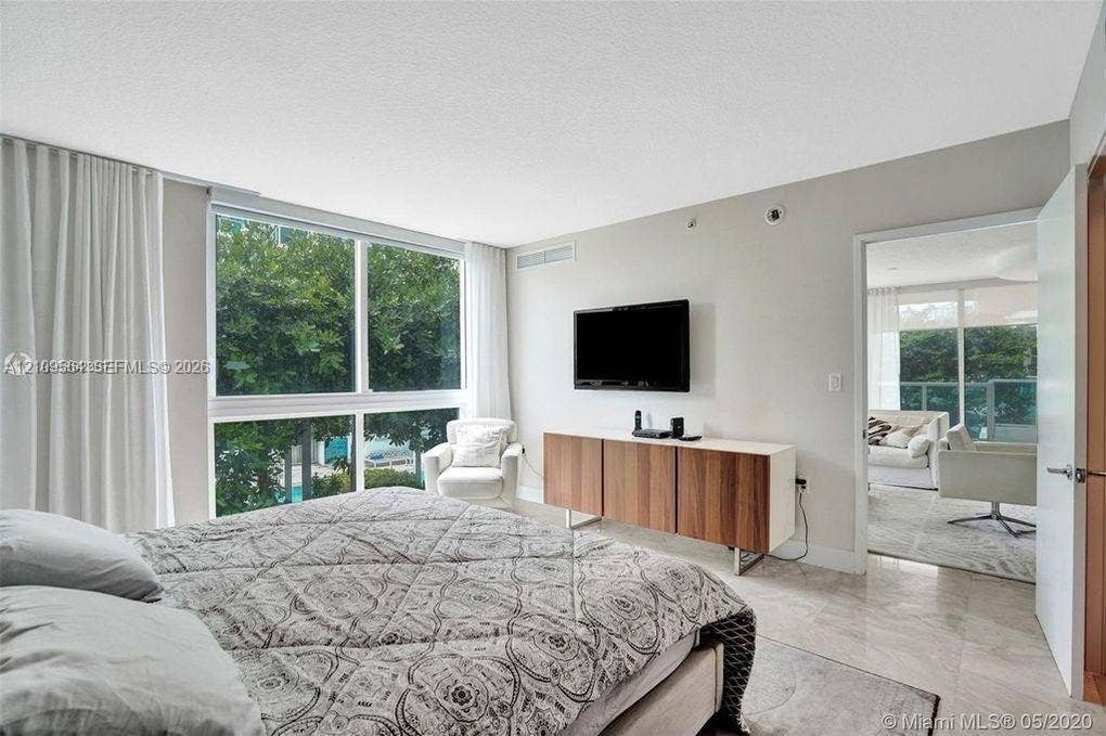 200 Sunny Isles Boulevard, #2-604, Sunny Isles Beach, Sunny Isles Beach, FL 33160 Floor-to-ceiling windows, polished stone flooring, and neutral wall tones