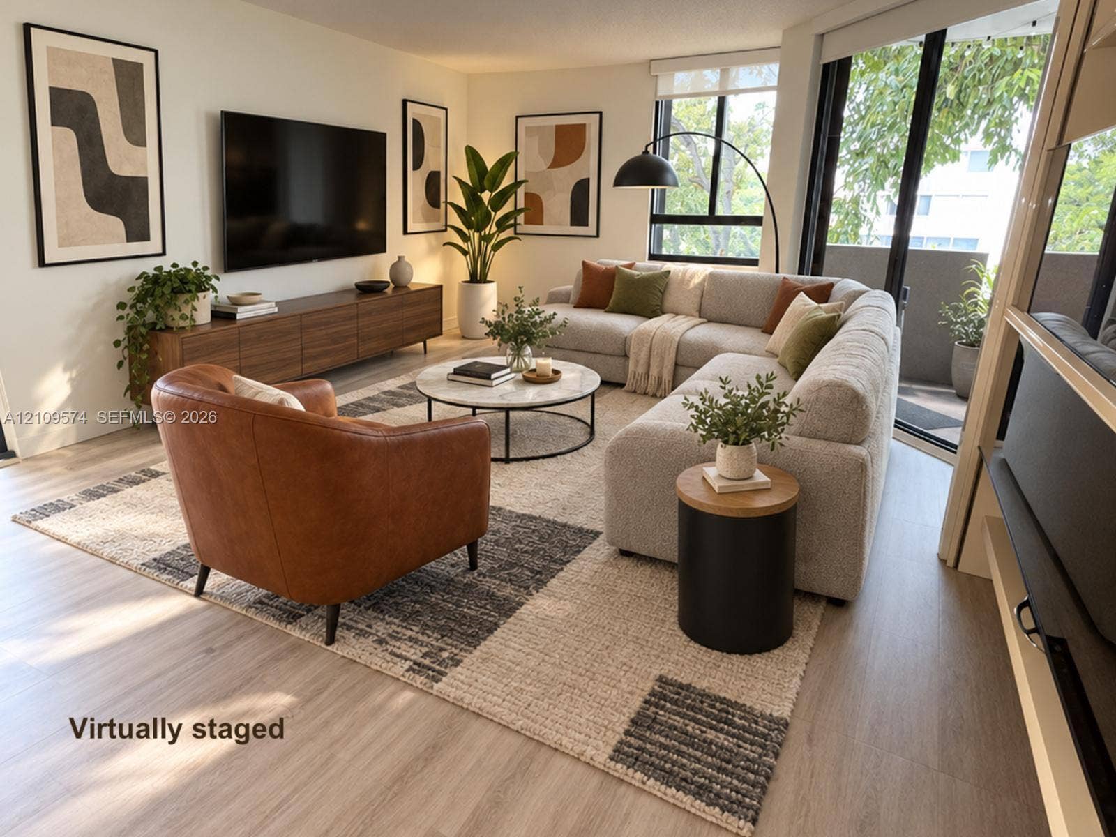 Staged. Vinyl Wood-finish flooring, floor-to-ceiling windows, and sliding glass door access to a private balcony