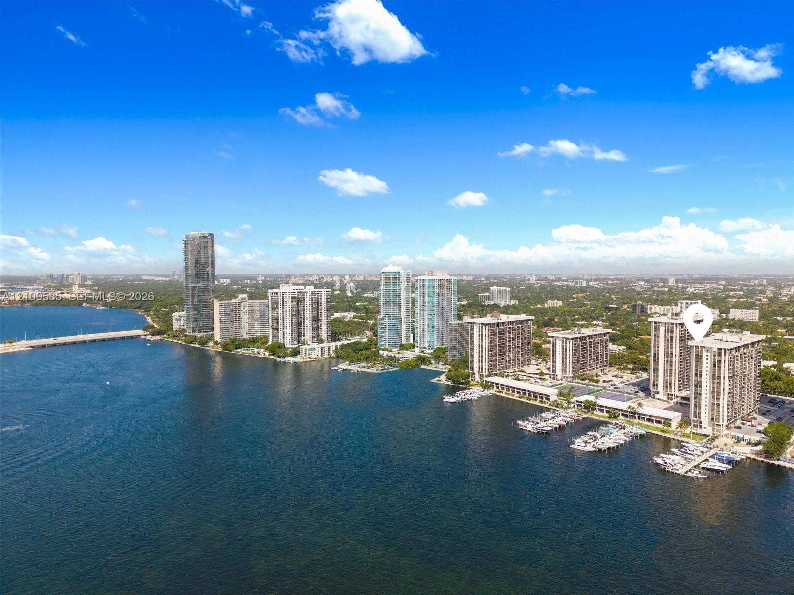 1865 Brickell Avenue, #APHVII, Miami, FL 33129 Waterfront high-rise building featuring boat slips, an outdoor swimming pool, and proximity to expansive coastal waterways
