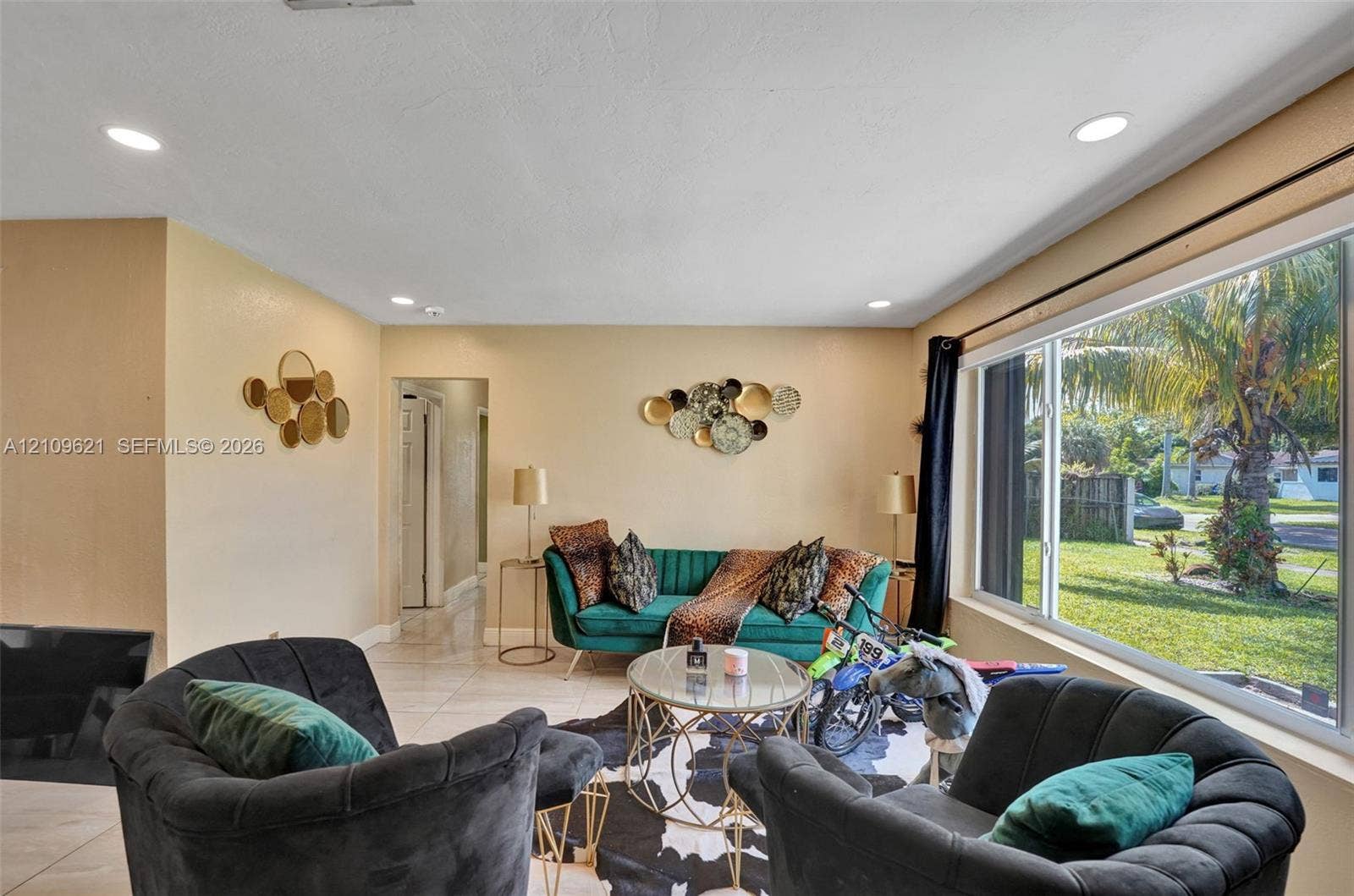 231 SW 64th Way, Pembroke Pines, FL 33023 Interior space featuring tile flooring, recessed lighting, and a large picture window