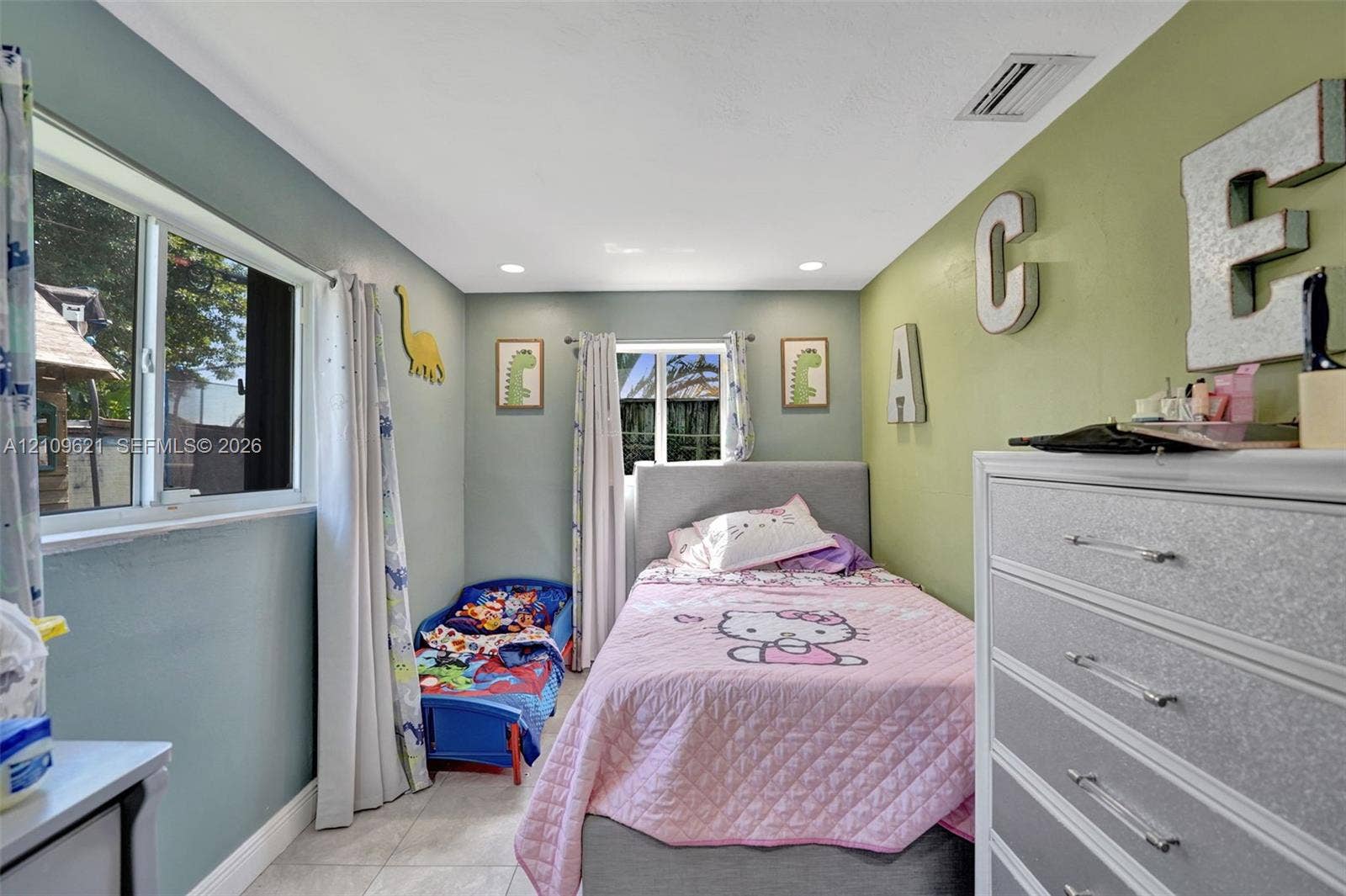 231 SW 64th Way, Pembroke Pines, FL 33023 Neutral-toned tiled flooring, recessed ceiling lighting, and dual-pane windows