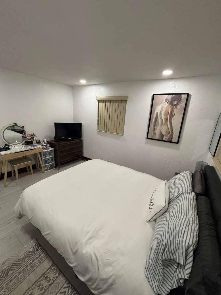 1881 SW 42nd Terrace, #2, Fort Lauderdale, Fort Lauderdale, FL 33317 Neutral-toned walls, recessed lighting, and wood-finish tile flooring