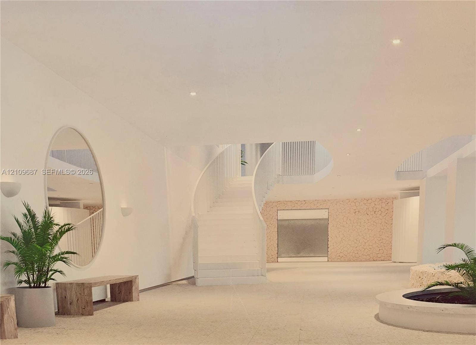 5555 Collins Avenue, #5C, Miami Beach, FL 33140 Curved architectural staircase with integrated railing, recessed ceiling lighting, textured stone-finish accent wall, and polished stone flooring