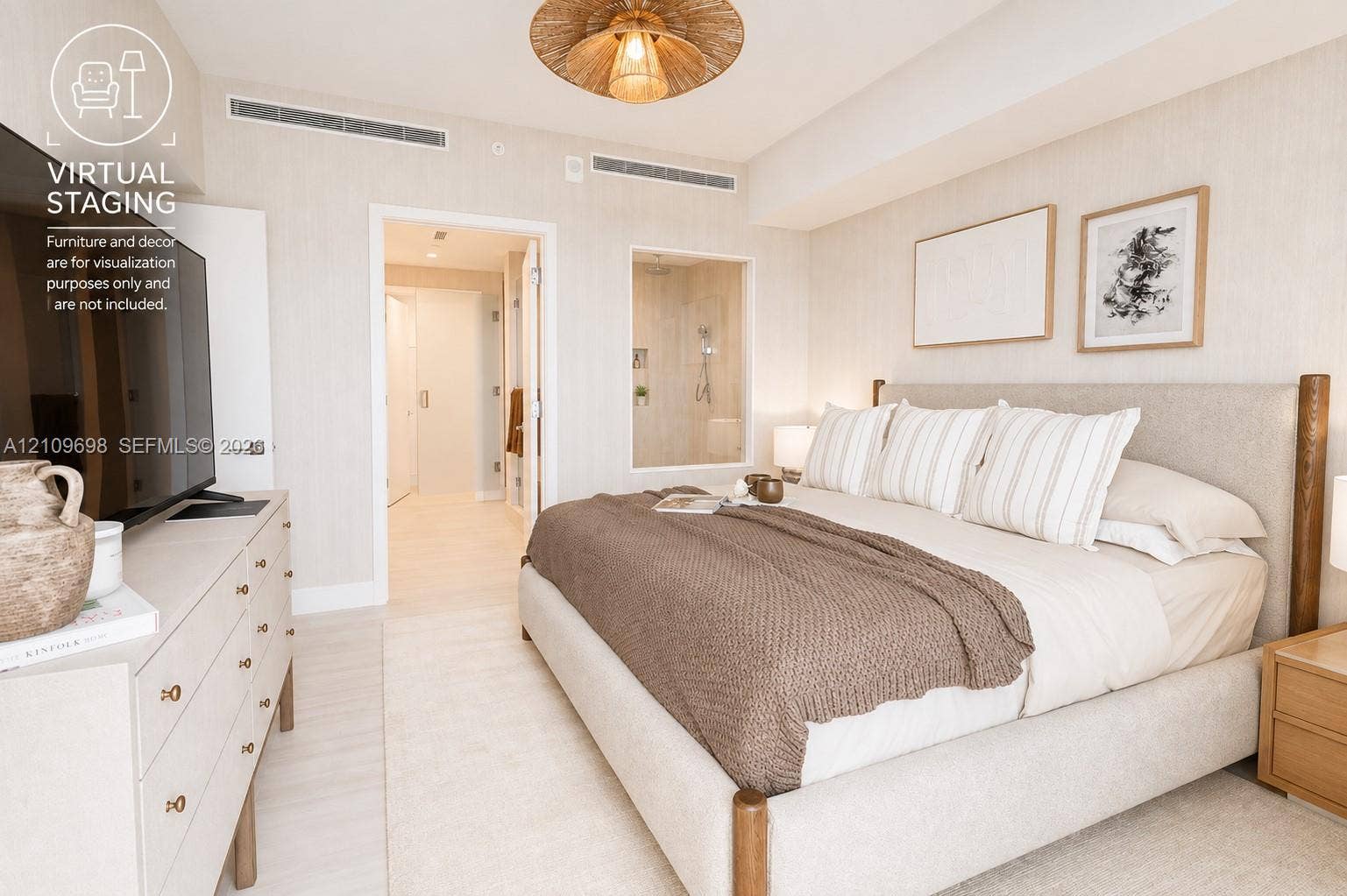 2411 Laguna Circle, #810, North Miami, FL 33181 Neutral textured wall coverings, woven drum light fixture, recessed ceiling climate control system, and glass-paneled interior wall section