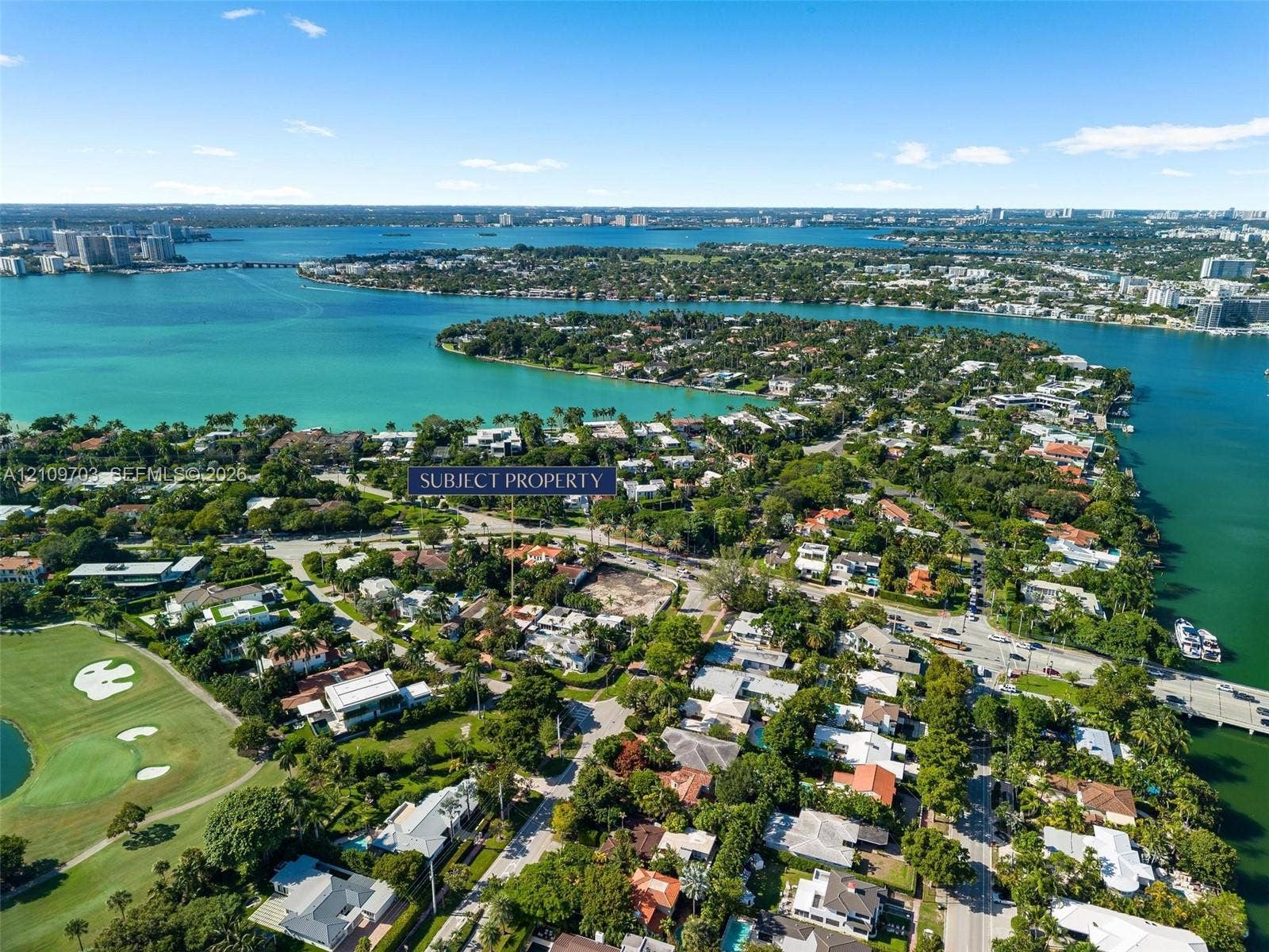 421 W 62nd Street, Miami Beach, FL 33140 Aerial perspective of a coastal residential lot featuring mature perimeter vegetation and proximity to waterfront inlets