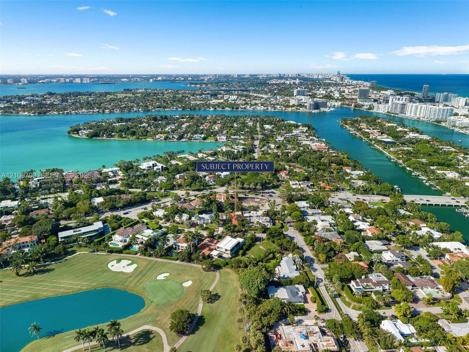 421 W 62nd Street, Miami Beach, FL 33140 Aerial perspective highlighting proximity to coastal waterways and expansive golf course fairways