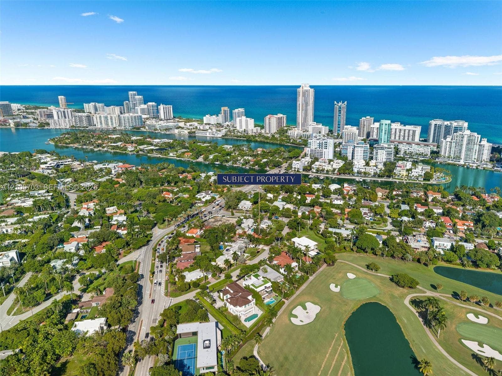 421 W 62nd Street, Miami Beach, FL 33140 Aerial perspective highlighting proximity to coastal waterways and expansive golf course fairways