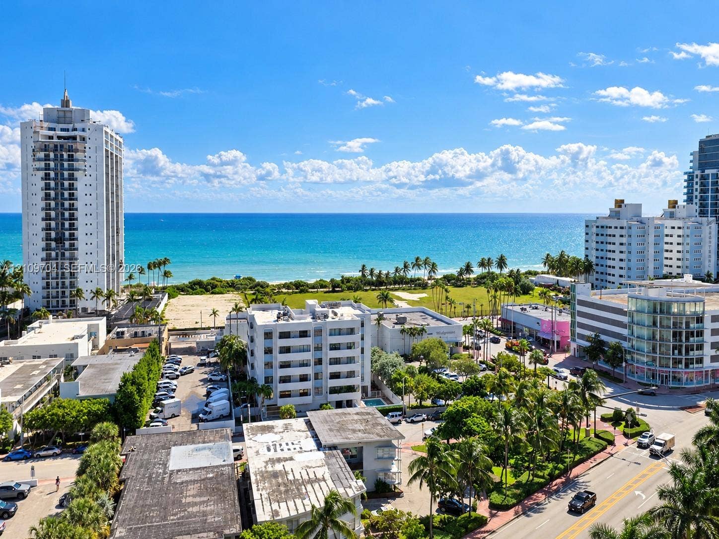 6770 Indian Creek Drive, #14C, Miami Beach, FL 33141 High-rise aerial perspective featuring expansive ocean exposure, proximity to coastal shoreline, and urban landscape with mature palm trees