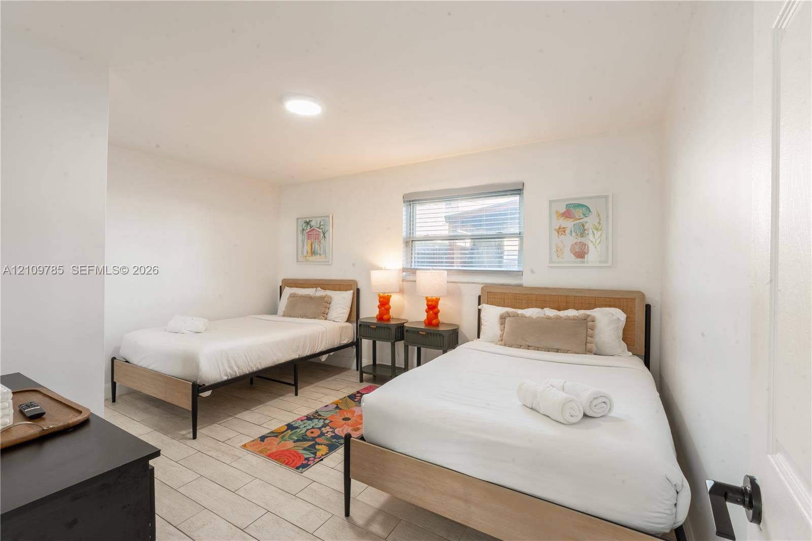 1469 NW 10th Street, #1471, Dania, Dania Beach, FL 33004 Neutral-toned ceramic tile flooring, flush-mount lighting fixture, and horizontal blind window treatment