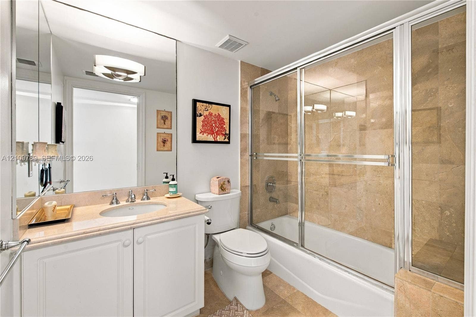 9595 Collins Avenue, #N6-B, Surfside, Surfside, FL 33154 Bathroom featuring a white vanity with a stone countertop, undermount sink, full-width mirror, and a tub-shower combination with floor-to-ceiling tile surround
