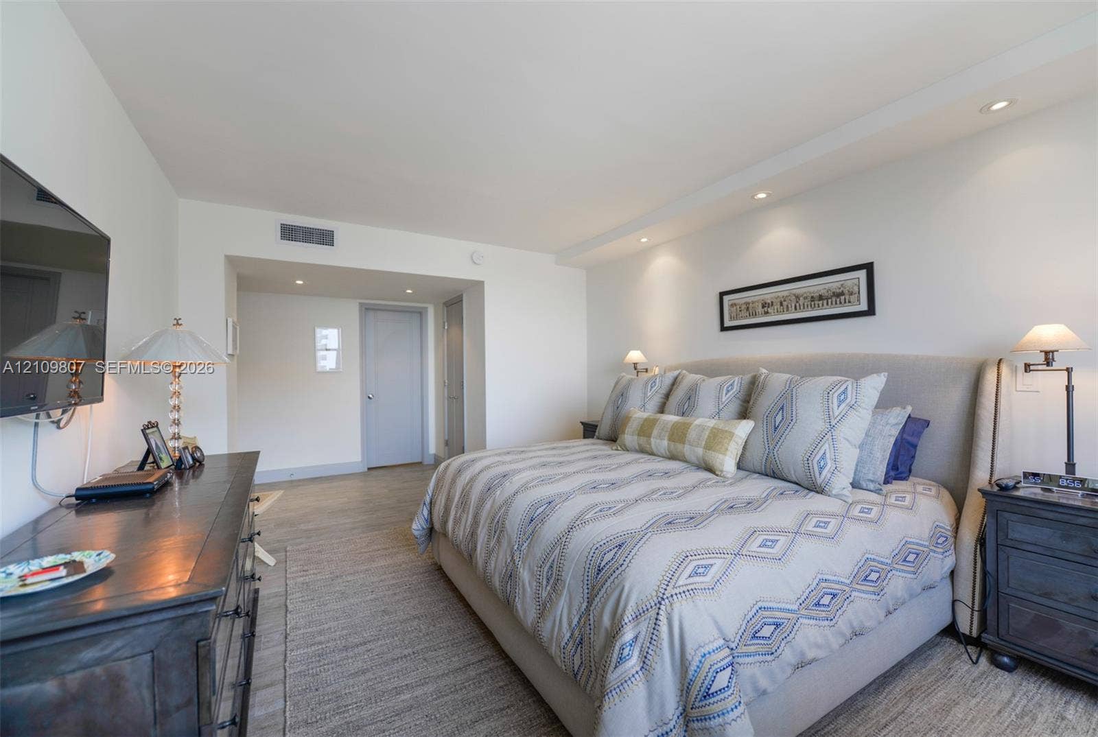 1980 S Ocean Drive, #16Q, Hallandale Beach, FL 33009 Neutral interior space featuring recessed ceiling lighting and wood-finish flooring