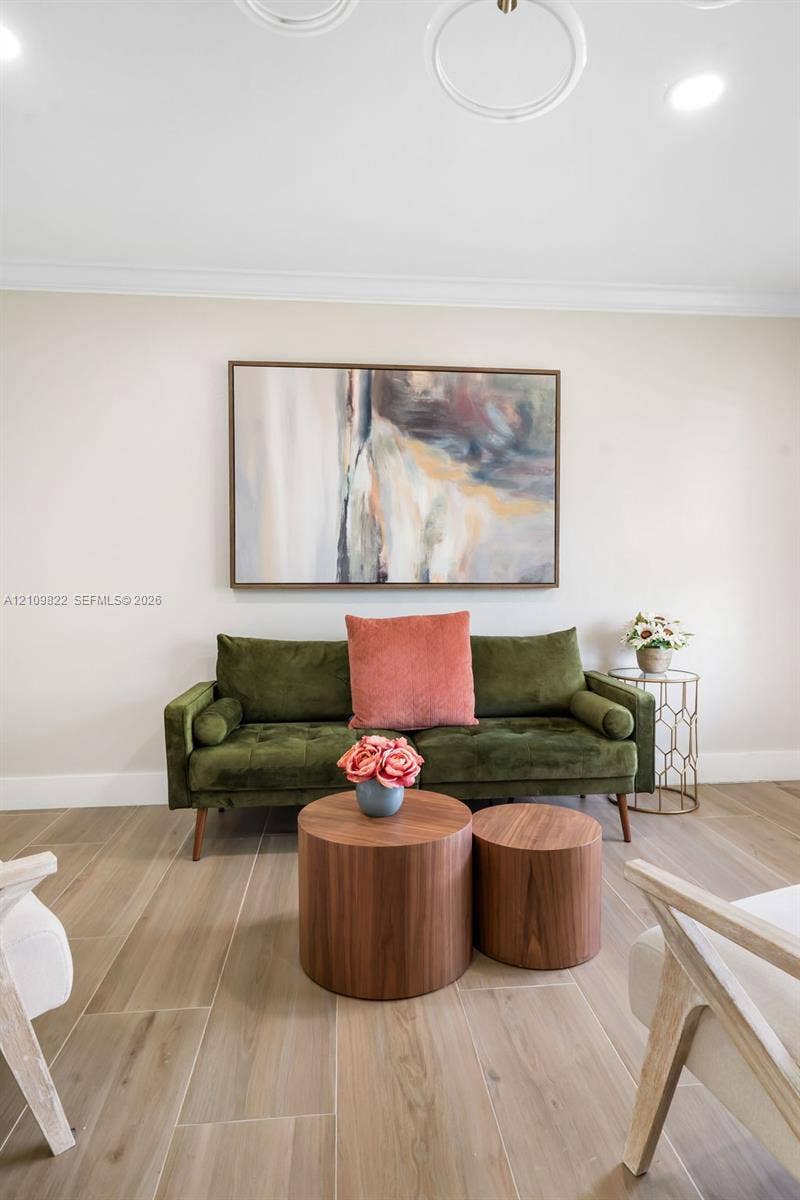 913 Lighthouse Drive, North Palm Beach, North Palm Beach, FL 33408 Wood-finish tile flooring, neutral wall palette, and recessed circular ceiling light fixtures