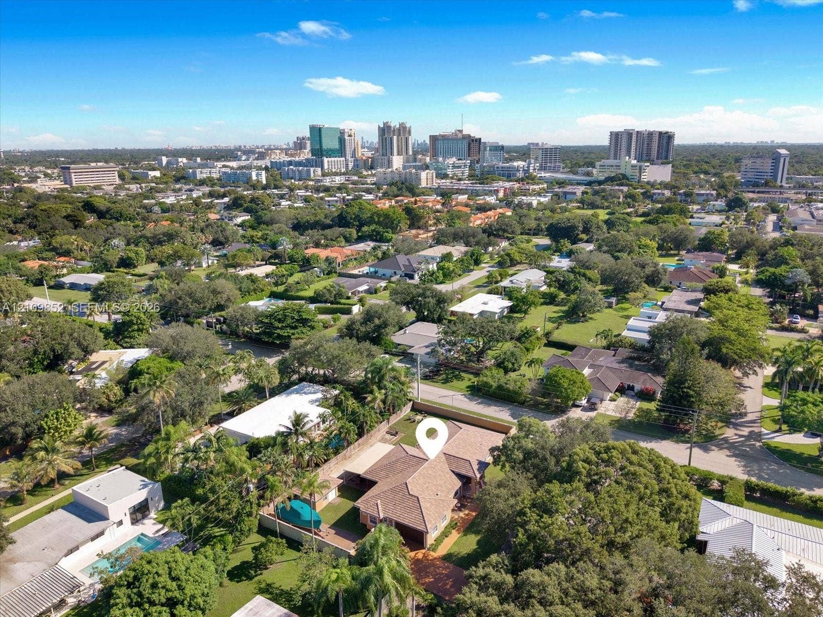 7901 SW 97th Street, Miami, FL 33156 Aerial perspective featuring Downtown Dadeland in the background *