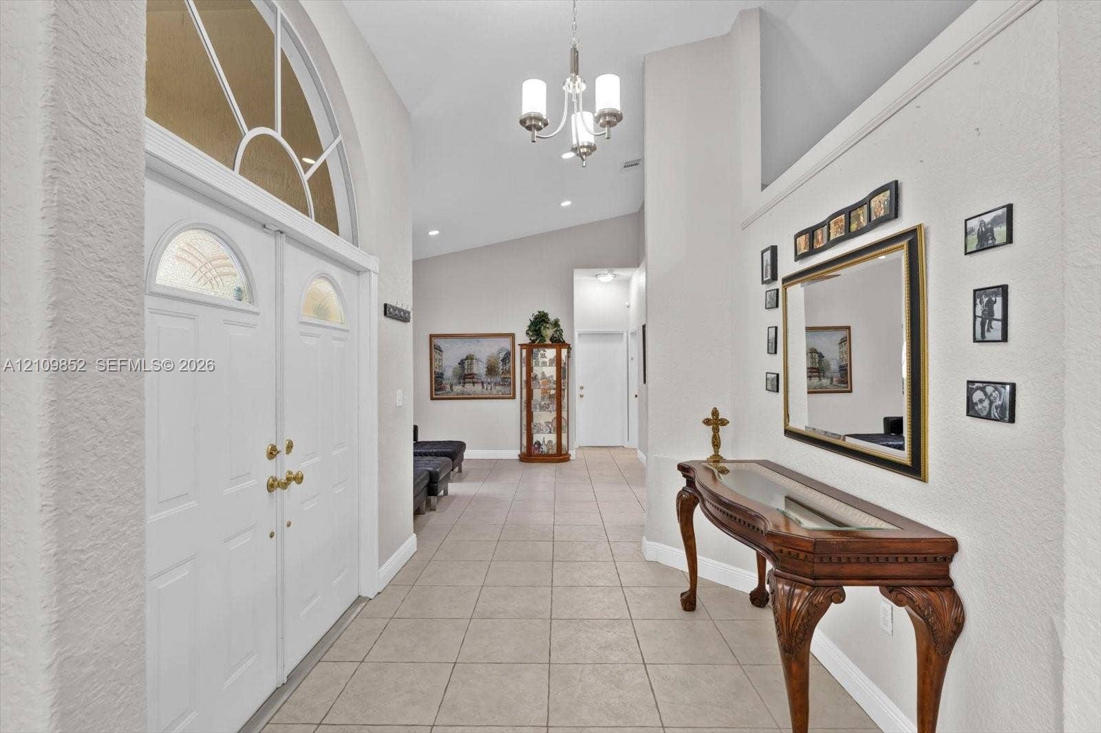 7901 SW 97th Street, Miami, FL 33156 Foyer featuring double entry doors with arched glass inserts *
