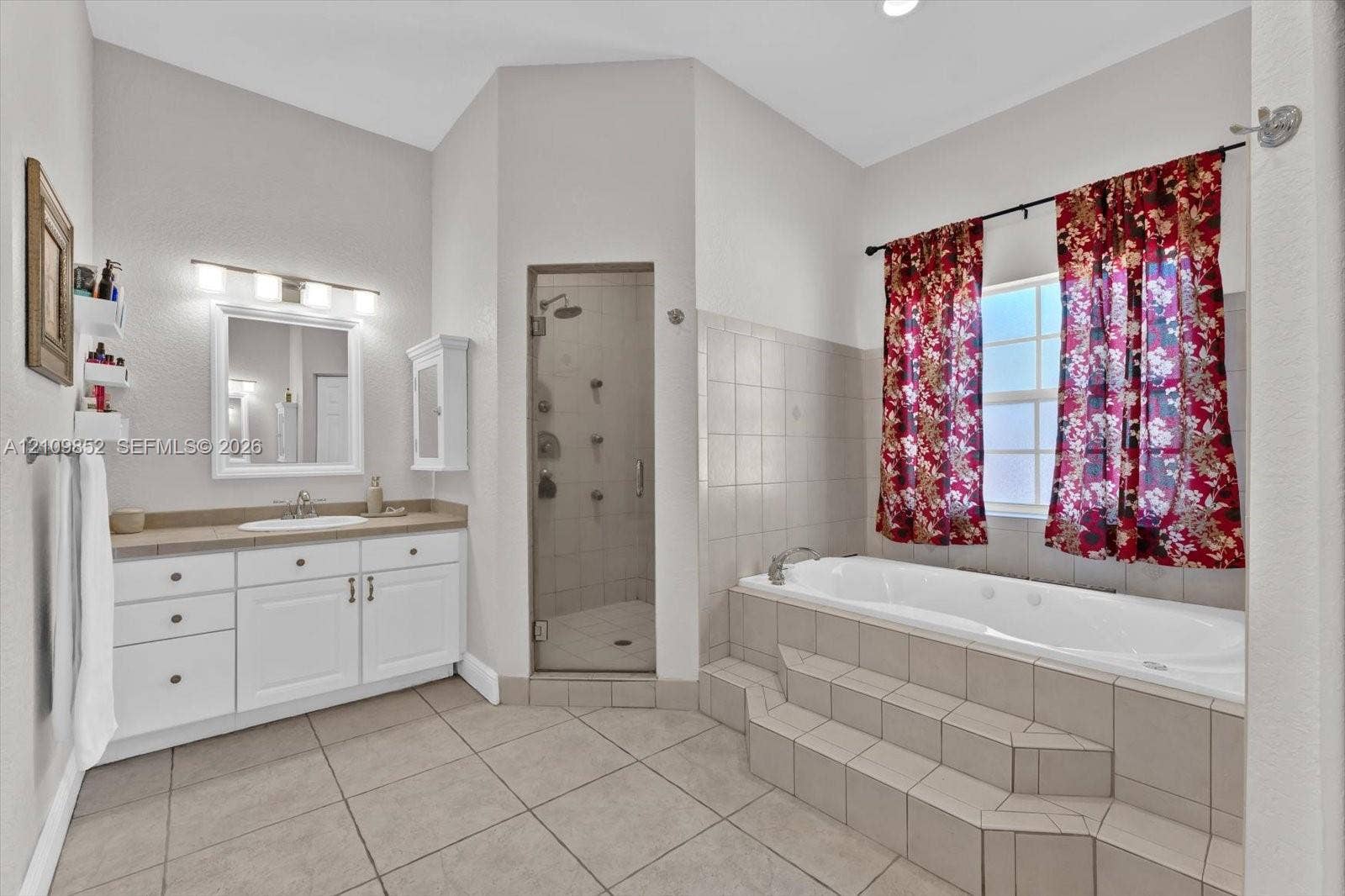 7901 SW 97th Street, Miami, FL 33156 Another main bathroom with of the glass-enclosed walk-in shower with multi high powered water jets and a built-in jetted soaking tub *