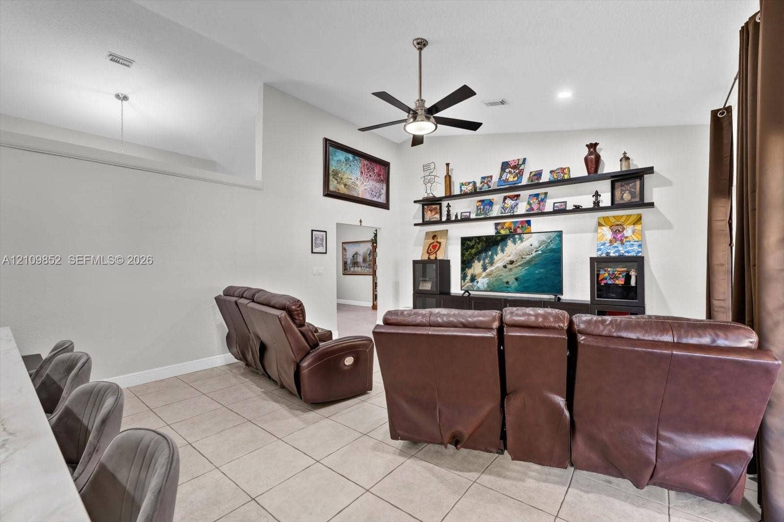 7901 SW 97th Street, Miami, FL 33156 Adjoining the kitchen is an oversized family room with volume ceilings and french doors leading to the covered patio and backyard *