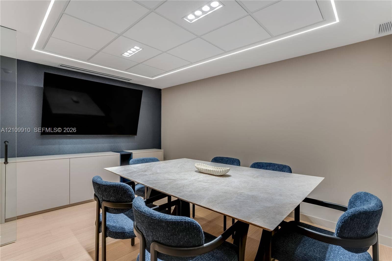 1170 E Hallandale Beach Boulevard, #908, Hallandale Beach, FL 33009 Built-in wall-to-wall cabinetry, recessed ceiling lighting with perimeter illumination, and light-toned wood-finish flooring