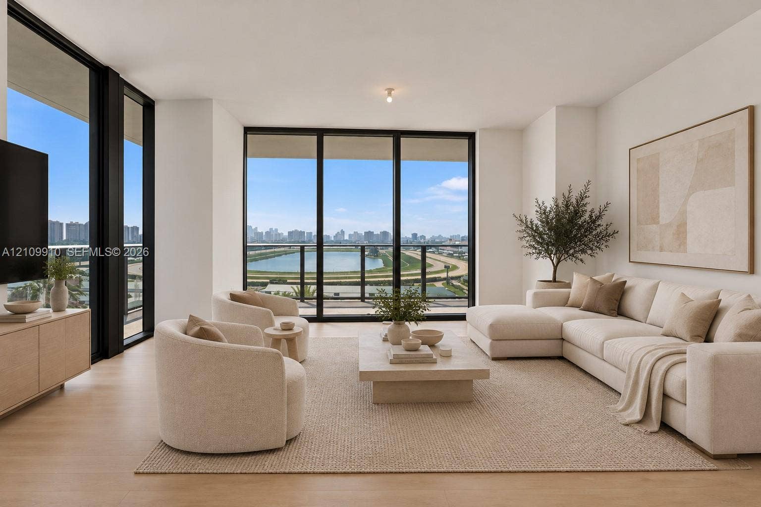 1170 E Hallandale Beach Boulevard, #908, Hallandale Beach, FL 33009 Floor-to-ceiling windows, wood-finish flooring, black window frames, and private balcony access with panoramic outdoor scenery