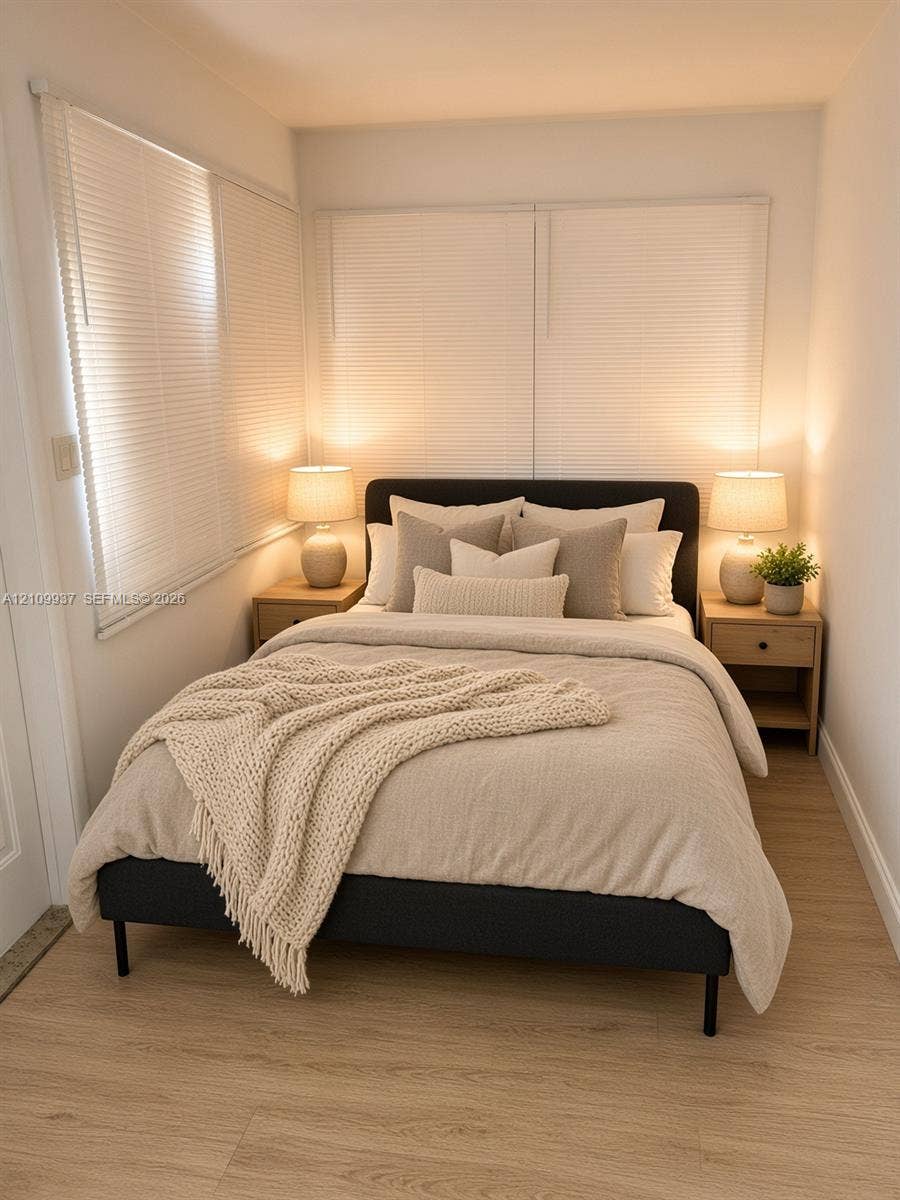 1024 Tyler Street, #2, Hollywood, Hollywood, FL 33019 Wood-finish flooring, dual windows with integrated horizontal blinds, and neutral wall tones