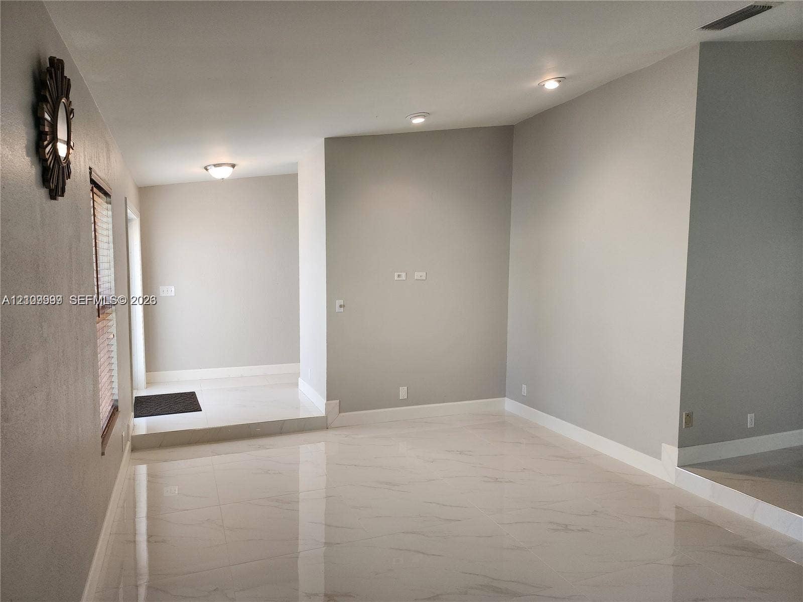 1794 NW 112th Terrace, Coral Springs, Coral Springs, FL 33071 Polished neutral-toned flooring, recessed ceiling lighting, and wall-mounted fixture