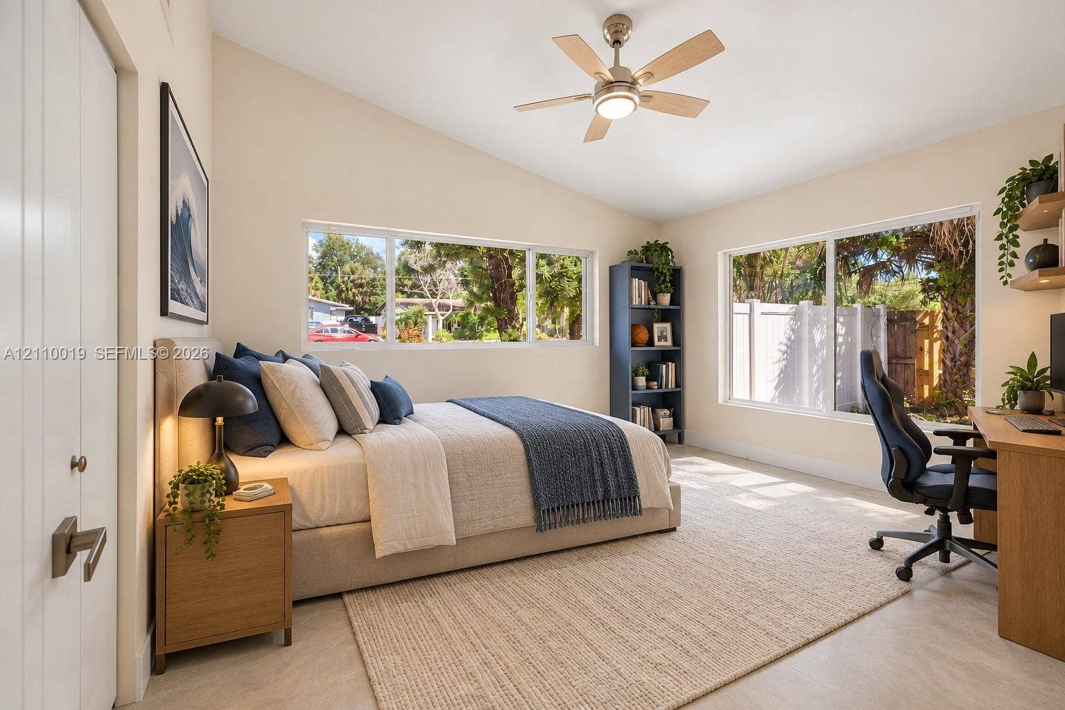 1708 SW 11th Street, Fort Lauderdale, Fort Lauderdale, FL 33312 Vaulted ceilings, large picture windows, and a ceiling fan with integrated lighting