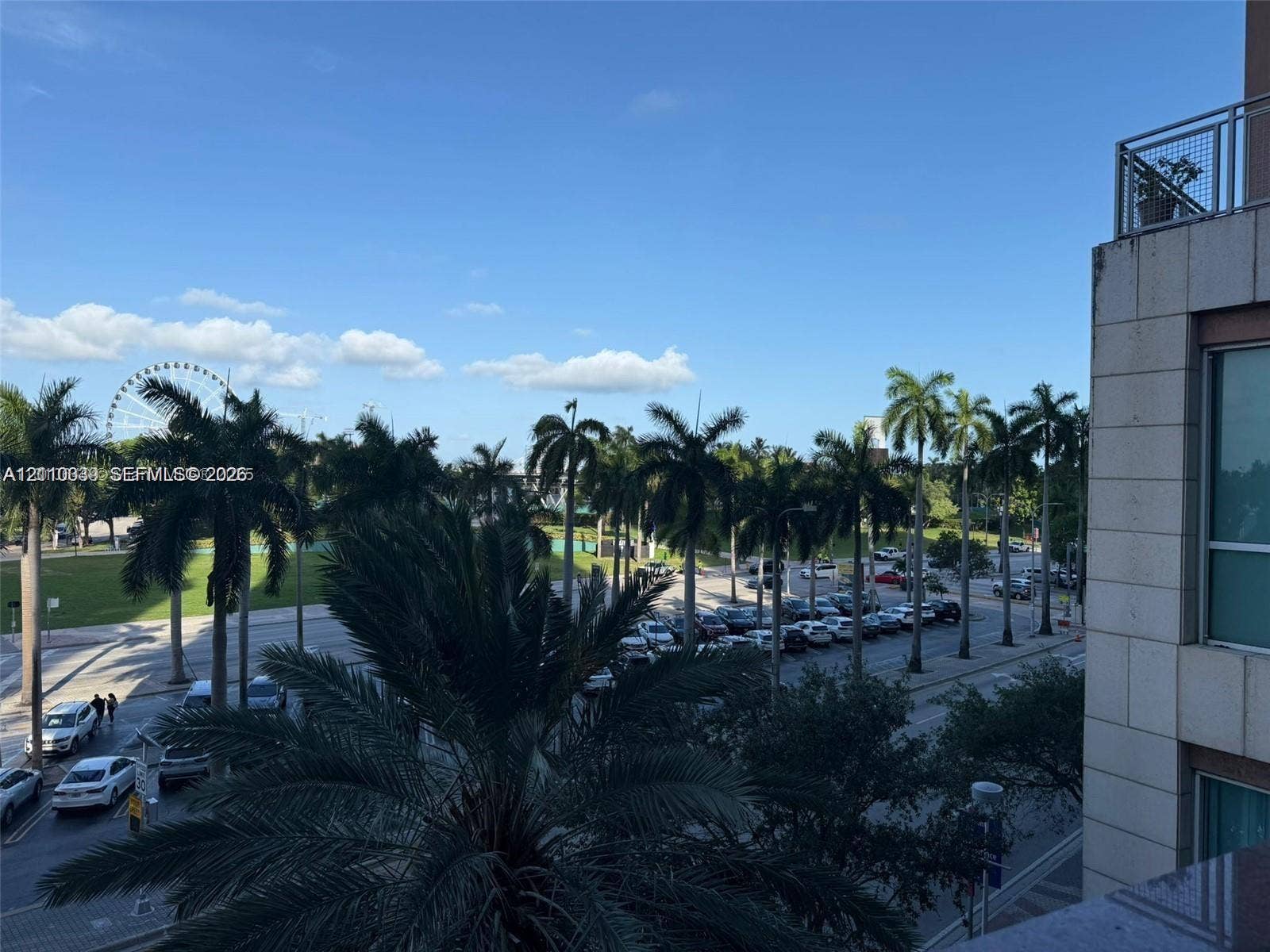 244 Biscayne Boulevard, #301, Miami, FL 33132 Exterior balcony featuring stone-tile cladding, metal railings, and natural scenery